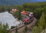 E/B unit stack train with CP 8109 leading, through Morant's Curve.